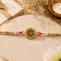 Round Om Motif Designer Rakhi with Beaded Traditional Detail