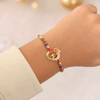 Peacock Designer Rakhi with Pearl Beaded Festive Detailing