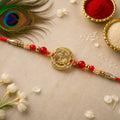 Round Krishna Designer Rakhi with Pearl Beaded Festive Detail