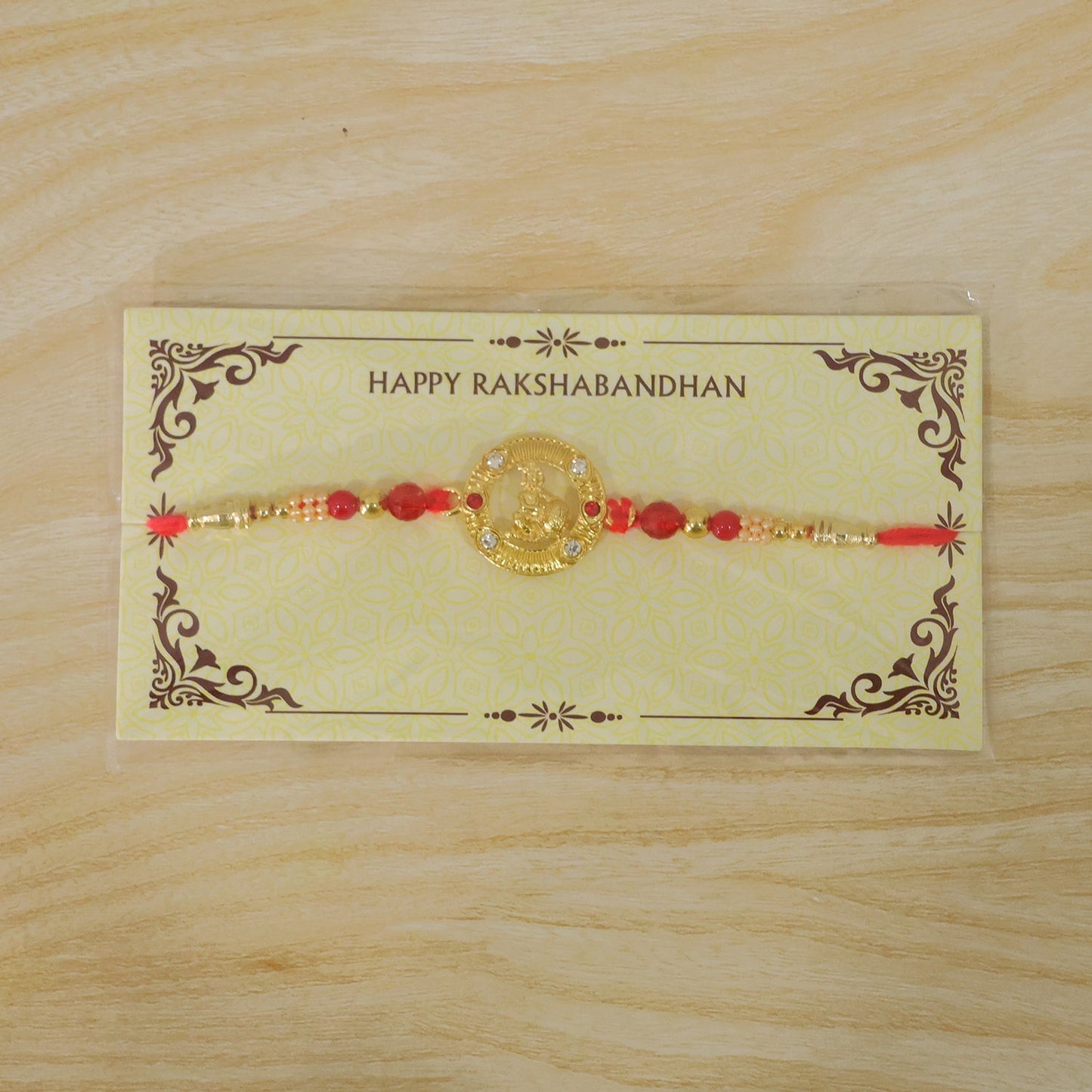 Round Krishna Designer Rakhi with Pearl Beaded Festive Detail