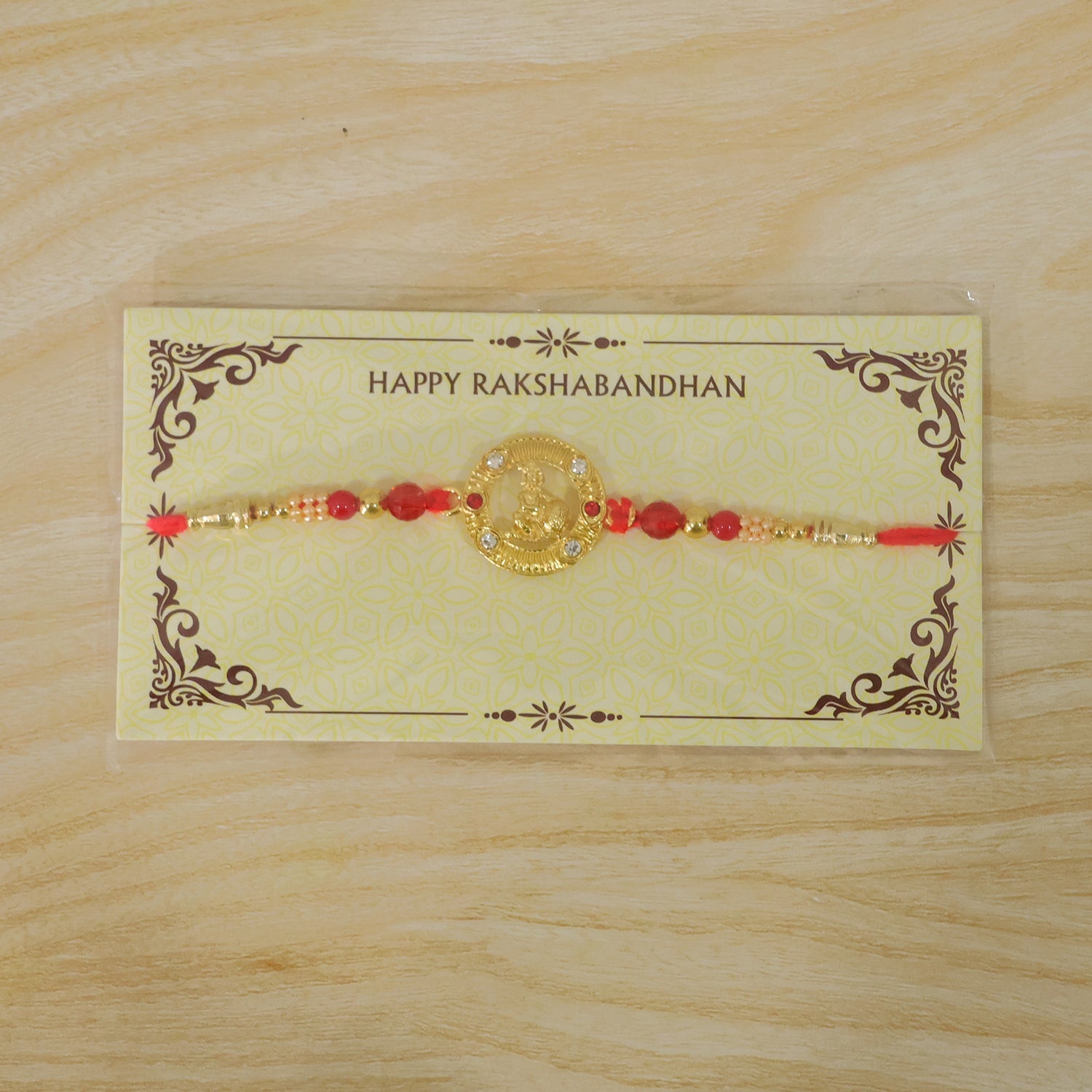 Round Krishna Designer Rakhi with Pearl Beaded Festive Detail