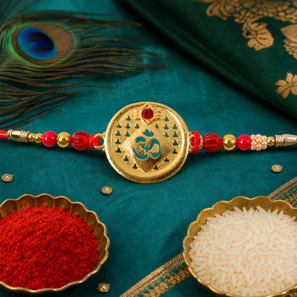 Round Om Coin Designer Rakhi with Stone Beaded Festive Detail
