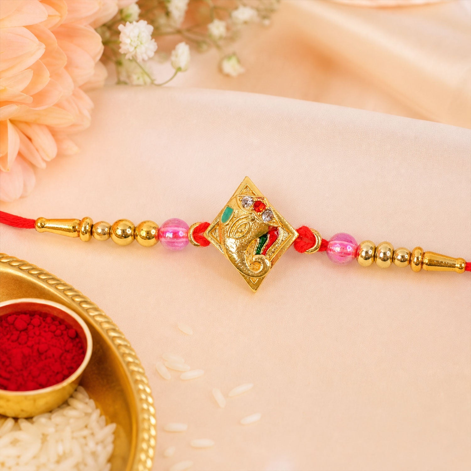 Ganesha motif Designer Rakhi with Beaded Festive Detailing Style