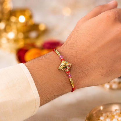 Ganesha motif Designer Rakhi with Beaded Festive Detailing Style