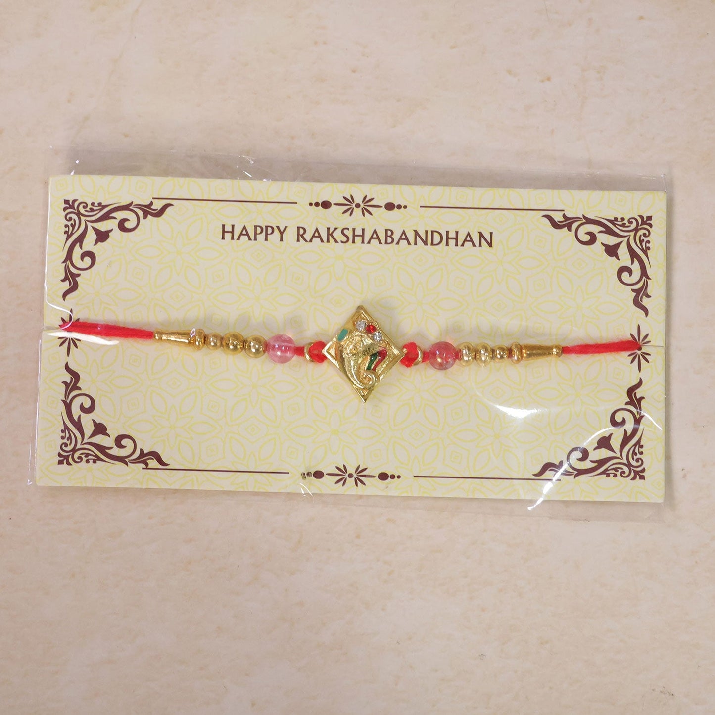 Ganesha motif Designer Rakhi with Beaded Festive Detailing Style