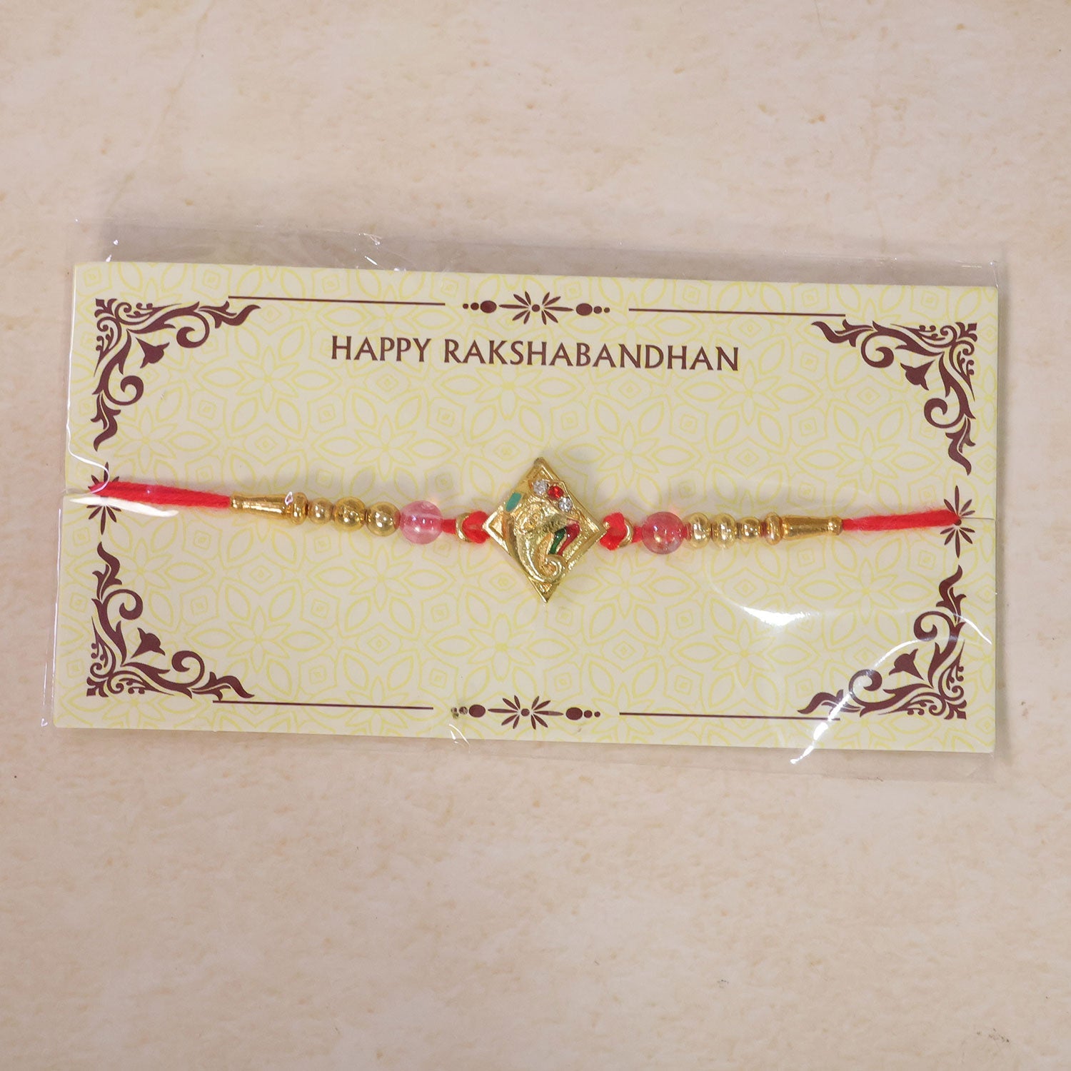 Ganesha motif Designer Rakhi with Beaded Festive Detailing Style