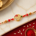 Leaf Om Om Designer Rakhi with Pearl Beaded Festive Detail Pattern