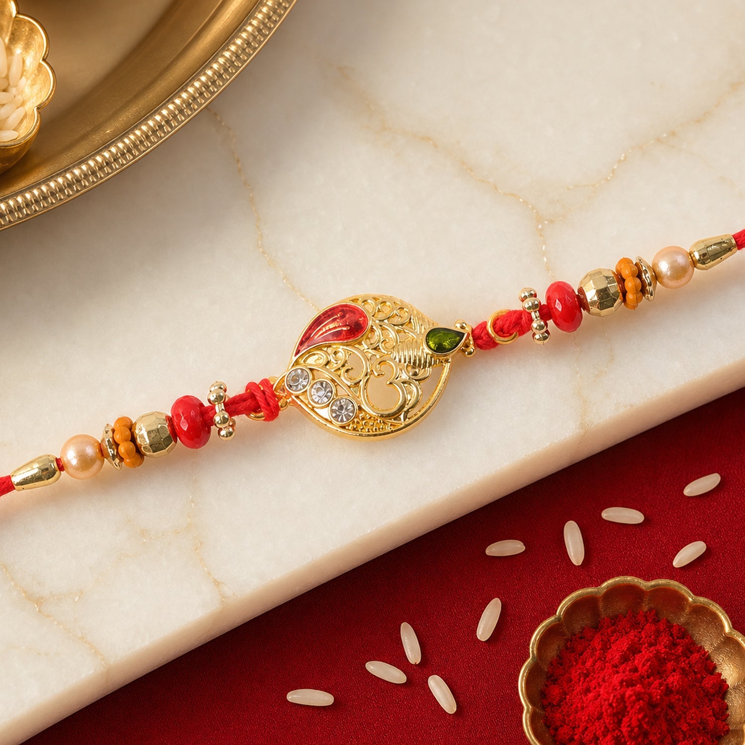 Leaf Om Om Designer Rakhi with Pearl Beaded Festive Detail Pattern