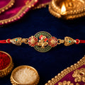 Ganesha Floral Designer Rakhi with Beaded Traditional Detailing