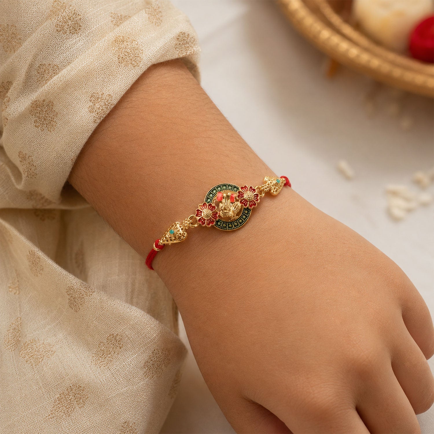 Ganesha Floral Designer Rakhi with Beaded Traditional Detailing