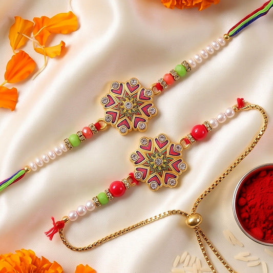 Two ornate floral Kundan bracelets with pink, green, and red beads, and white pearls, on a white satin cloth with orange