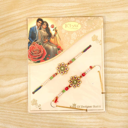 Two floral Kundan bracelets with colorful beads and pearls, packaged on a card with an illustration of a couple and a red