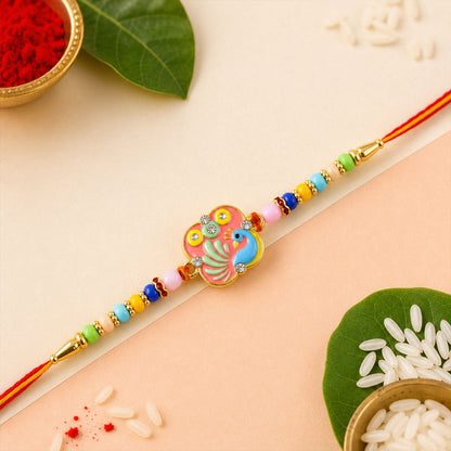 Peacock Motif Kids Beaded Rakhi Combo with Festive Charm (2 Pc)