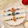 Devotional Motif Beaded Rakhi with Lovely Sacred Center Charm (3 Pc)