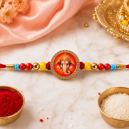 Ganesh Devotional Beaded Rakhi with Sacred Charm Work (3 Pc)
