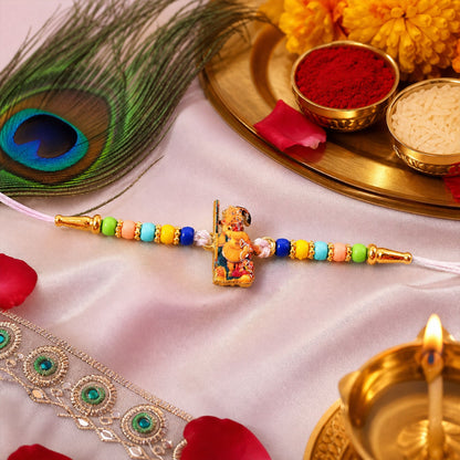 Krishna Peacock Beaded Rakhi with Devotional Charm (4 Pc)