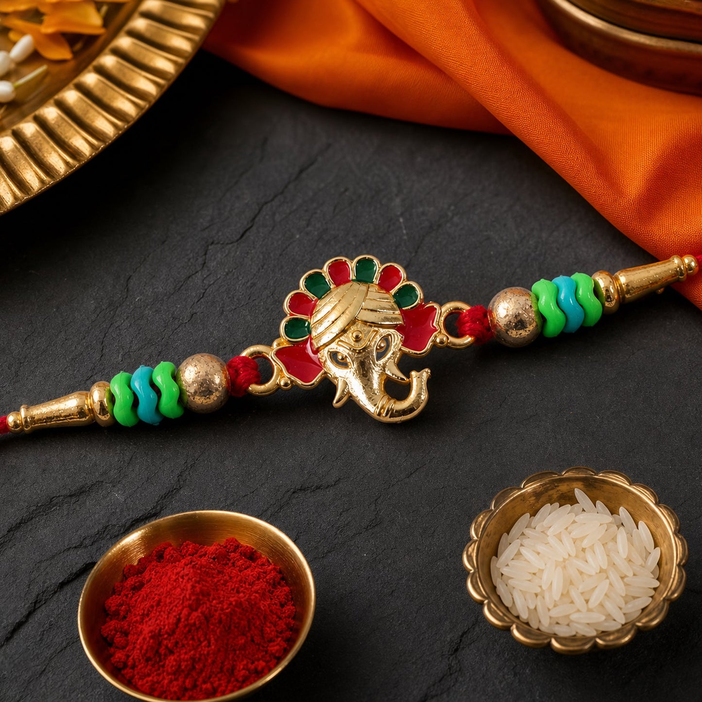 Ganesha Kundan Beaded Rakhi with Royal Crown Center Charm Design