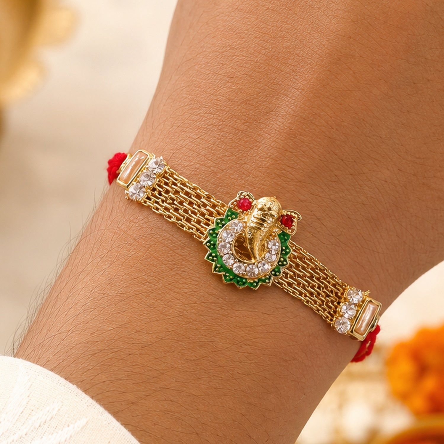 Ganesha Charm Rakhi with Elegant Stone Center Motif Design