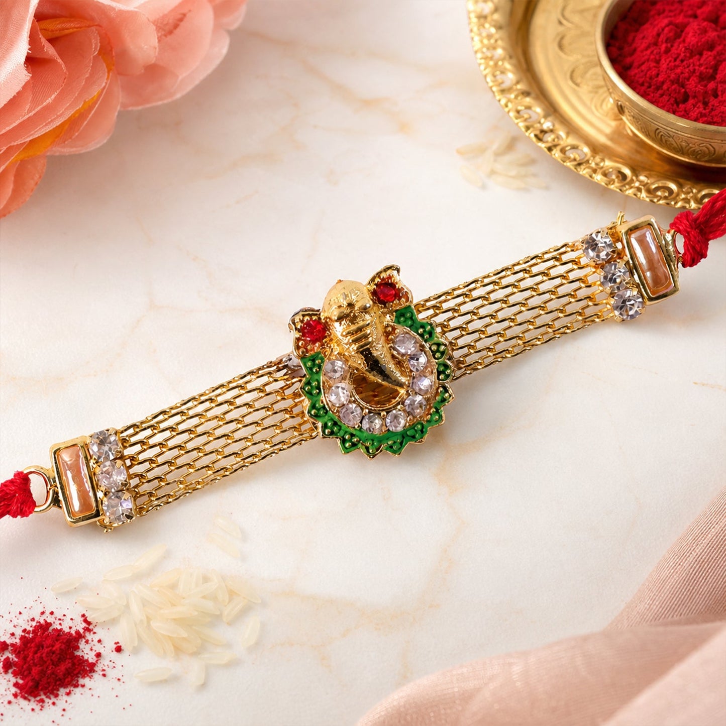 Ganesha Charm Rakhi with Elegant Stone Center Motif Design