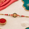 Stylish Ganesh Motif Rakhi with Ornamental Beaded Center Design