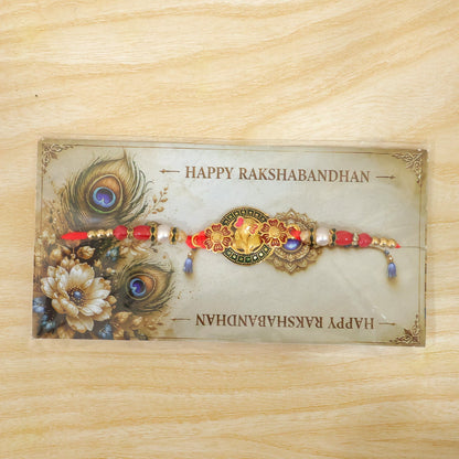 Stylish Ganesh Motif Rakhi with Ornamental Beaded Center Design