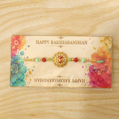Om Floral Kundan Rakhi with Pearl Beads and Traditional Motif Design