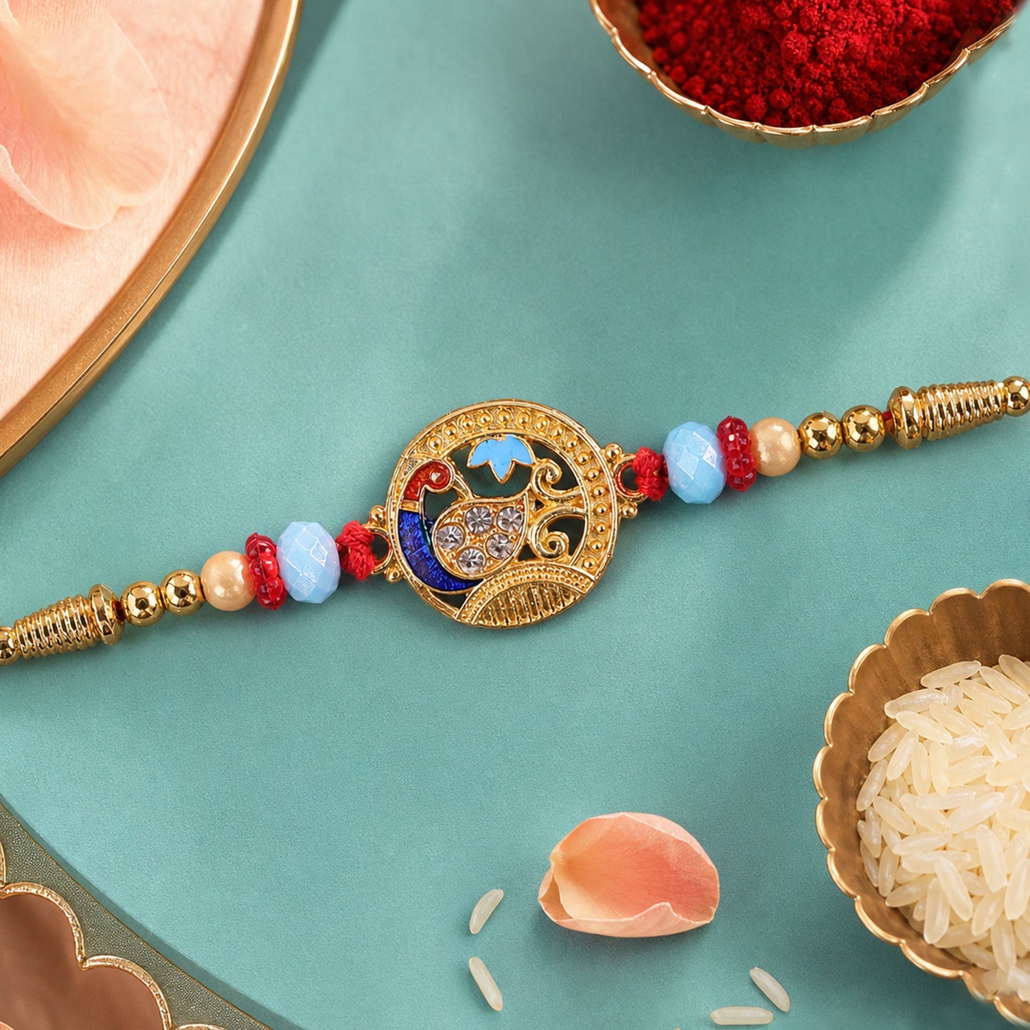 Round Peacock Motif Rakhi with Beaded Sacred Center Charm Design