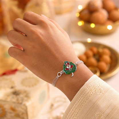 Leaf Ganesha Motif Stone Rakhi with Elegant Chain Center Detail Design