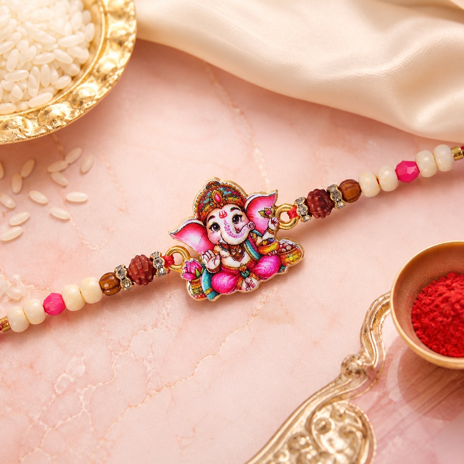Cute Ganesha Pearl Beaded Rakhi with Playful Center Charm Design