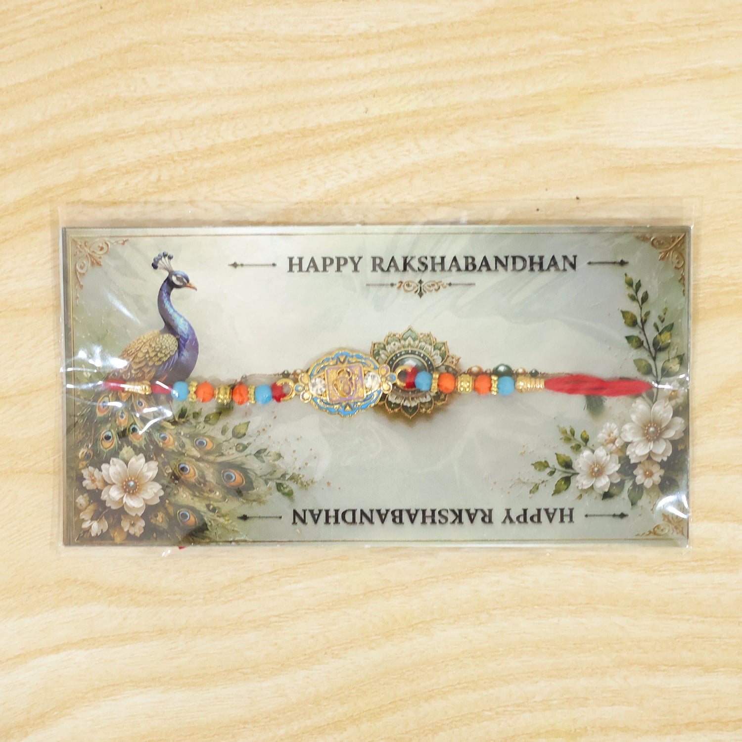Round Ganesha Motif Stone Rakhi with Pearl Beads and Sacred Center Detail