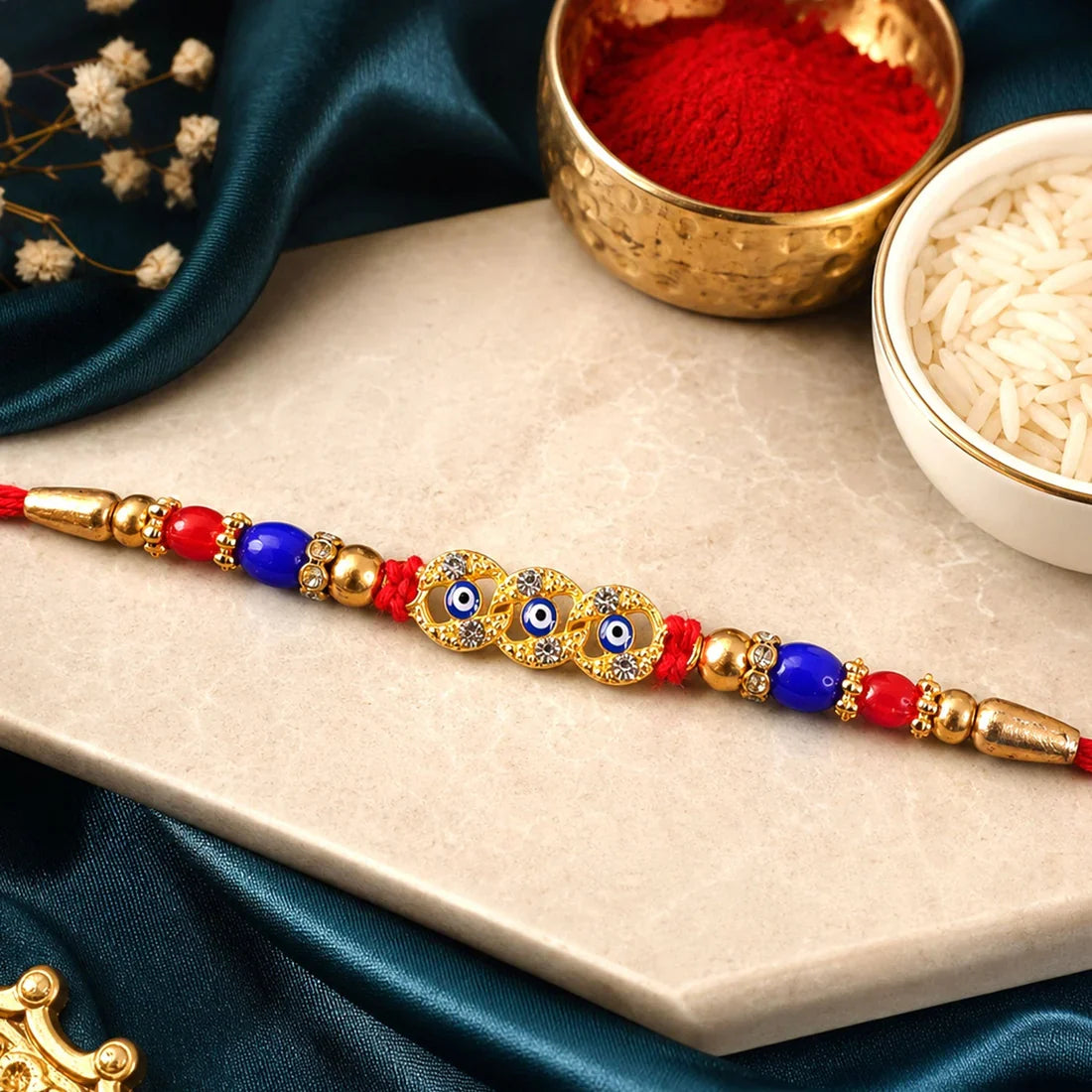 Peacock Feather, Floral Clover Charm & Evil Eye Stone Rakhi for Brother (3 Pc)
