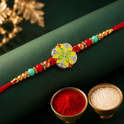 Floral Meenakari, Om Damaru Stone & Pinwheel Crystal Rakhi for Brother (3 Pc Set)