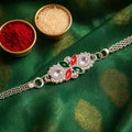 Shiva Trishul, Silver Red-Green Enamel & Floral Chain Rakhi for Brother (3 Pc Set)