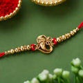 Mor Pankh Feather, Golden Swirl Peacock & Premium Ganesha Rakhi for Brother (3 Pc)