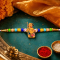 Gold-Plated Floral, Silver Ganesh Bracelet & Hanuman Ji Rakhi for Brother (3 Pc)