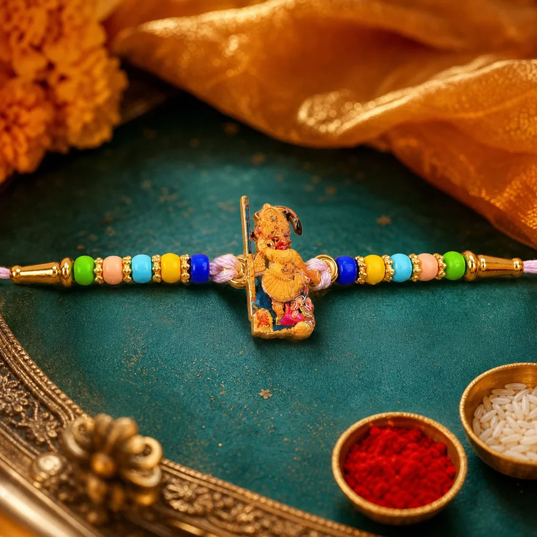 Gold-Plated Floral, Silver Ganesh Bracelet & Hanuman Ji Rakhi for Brother (3 Pc)