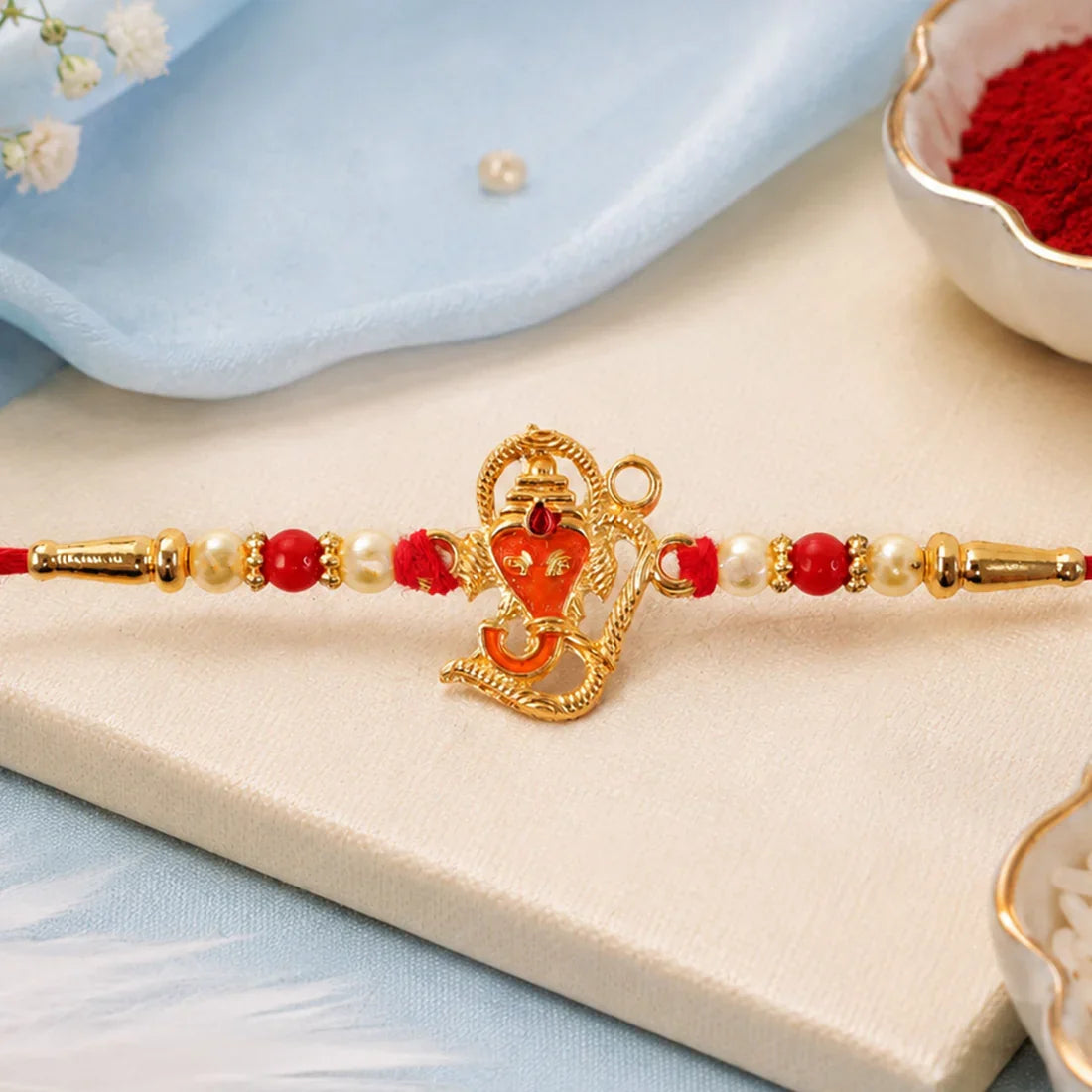 Premium Multicolor Beads, Ganesha & Peacock Design Rakhi for Brother (3 Pc Set)