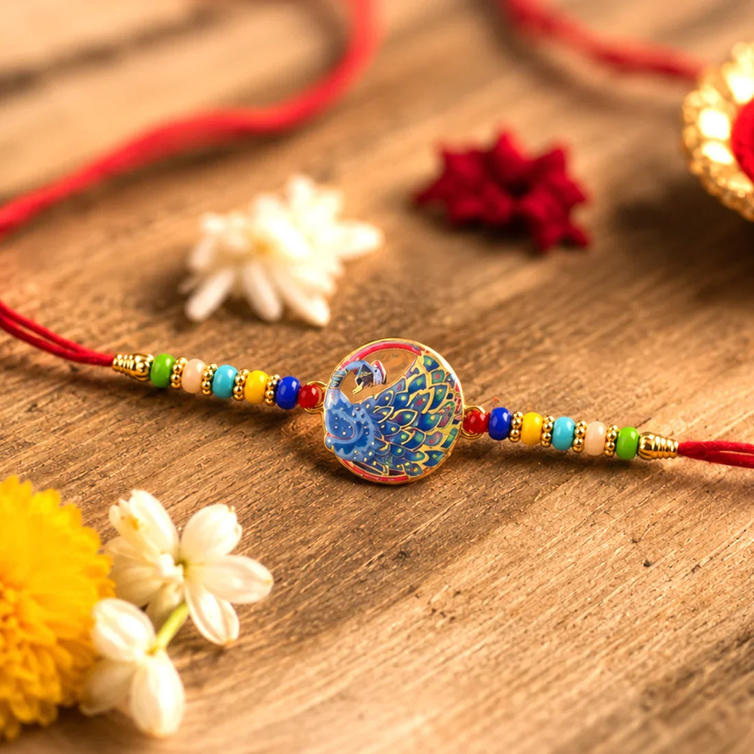 Premium Multicolor Beads, Ganesha & Peacock Design Rakhi for Brother (3 Pc Set)
