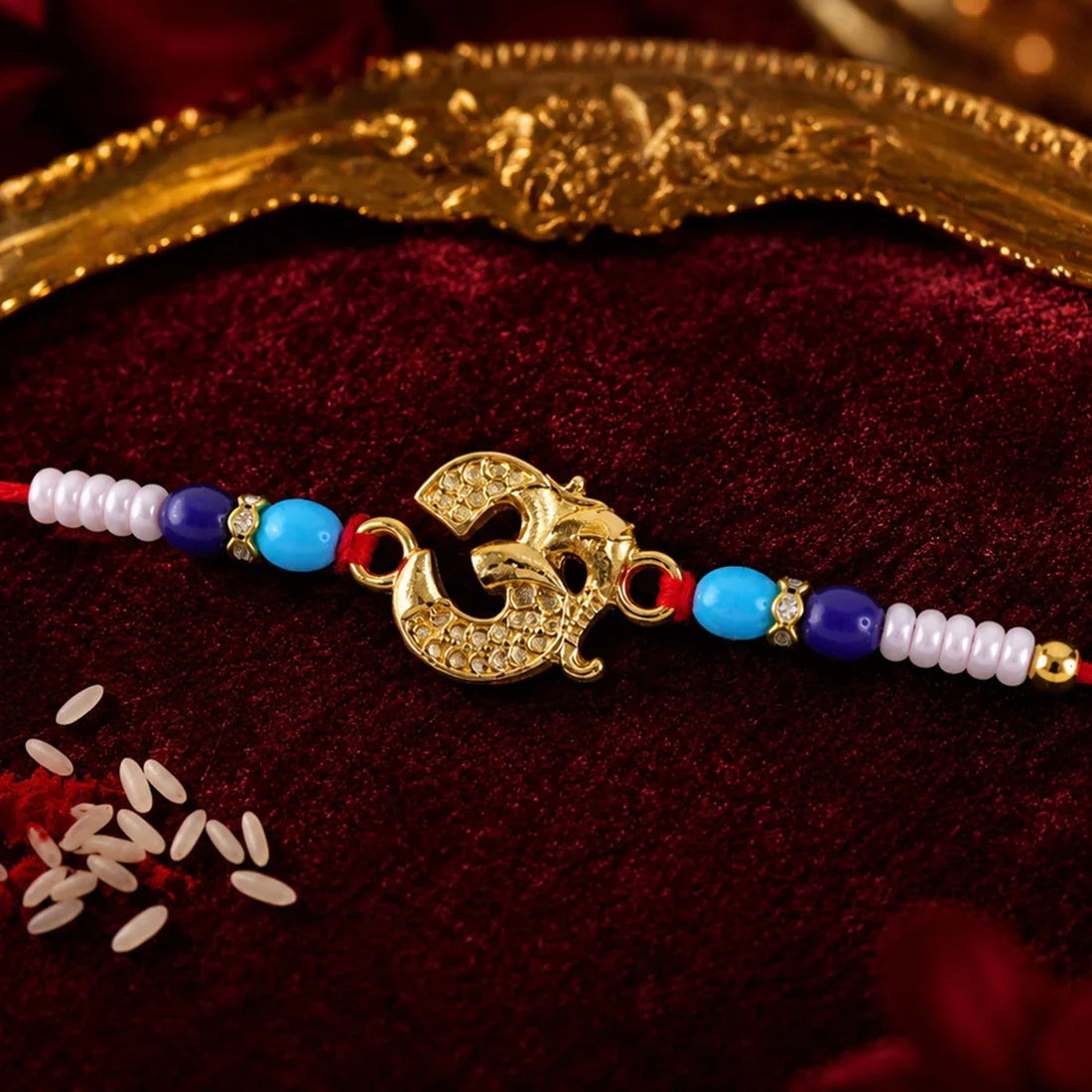 Floral Stone, Pink-Blue Enamel & Om Symbol Beaded Rakhi for Brother (3 Pc Set)