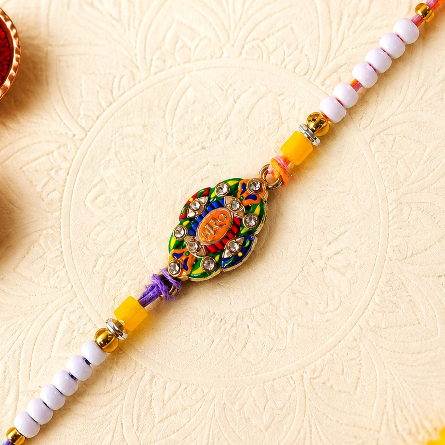 Oval Bro Text Meenakari Kundan Enamel Vibrant Cylinder Beads Rakhi