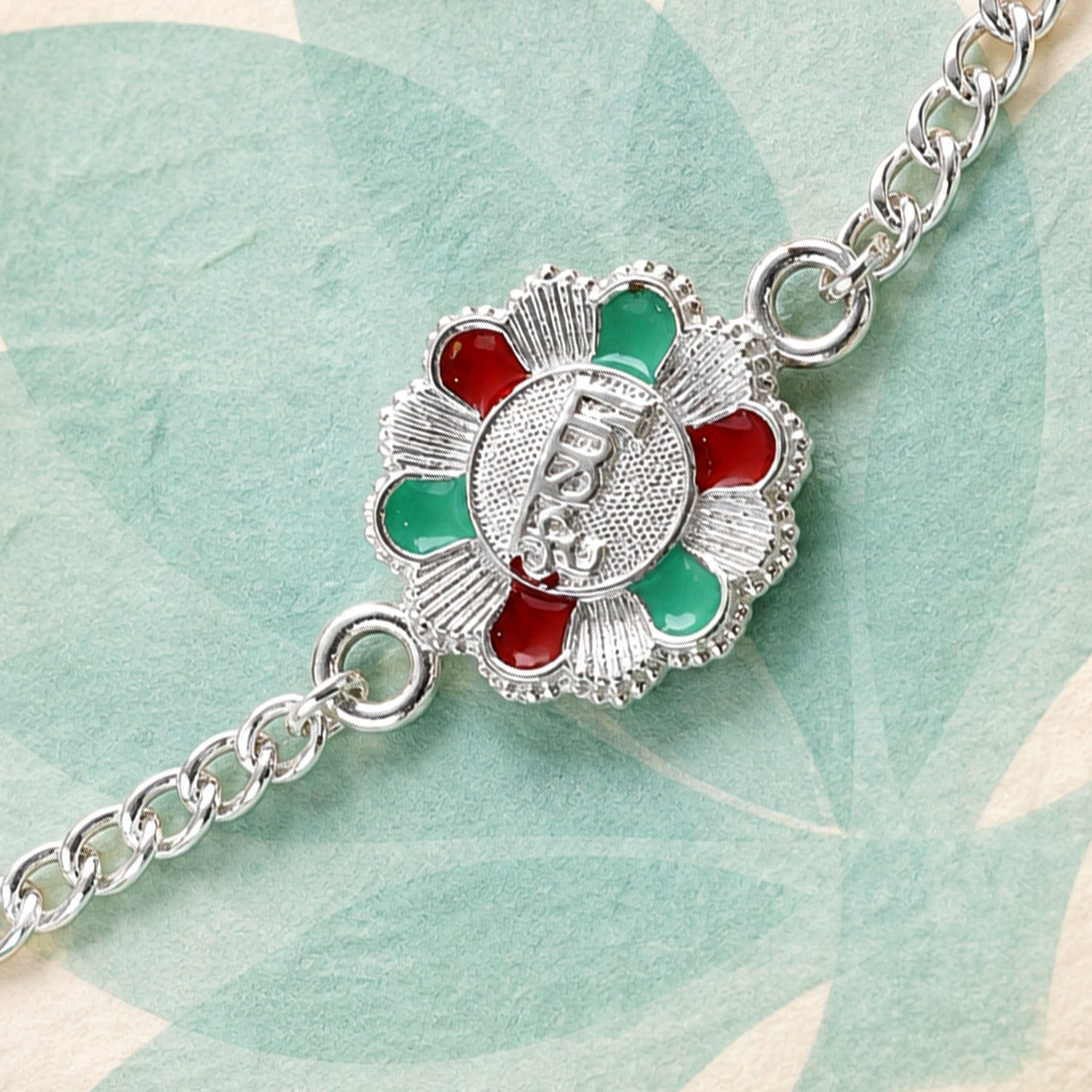 Krishna Engraved Floral Stone Silver Chain Designer Rakhi