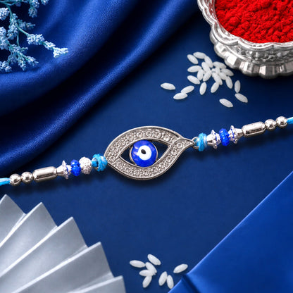 Evil Eye Rakhi with Studded Charm – Blue Crystal Beads