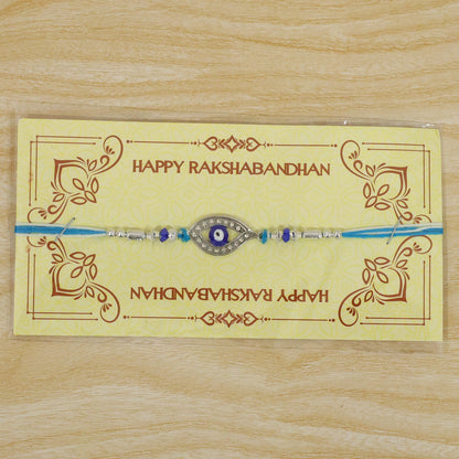 Evil Eye Rakhi with Studded Charm – Blue Crystal Beads