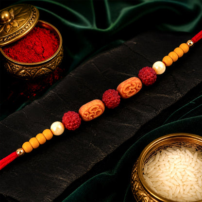 Stylish Om Charm Rudraksha Rakhi with Pearl & Sandalwood Beads