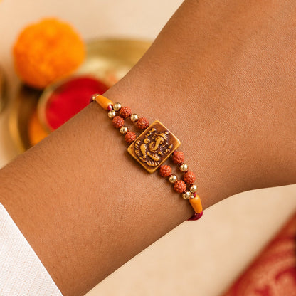 Ganesha Rudraksha Rakhi with Golden Beads – Traditional Rakhi