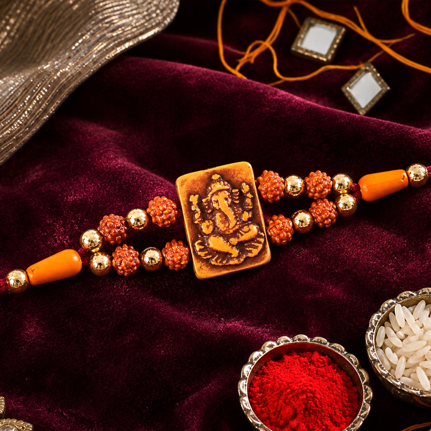 Ganesha Rudraksha Rakhi with Golden Beads – Traditional Rakhi