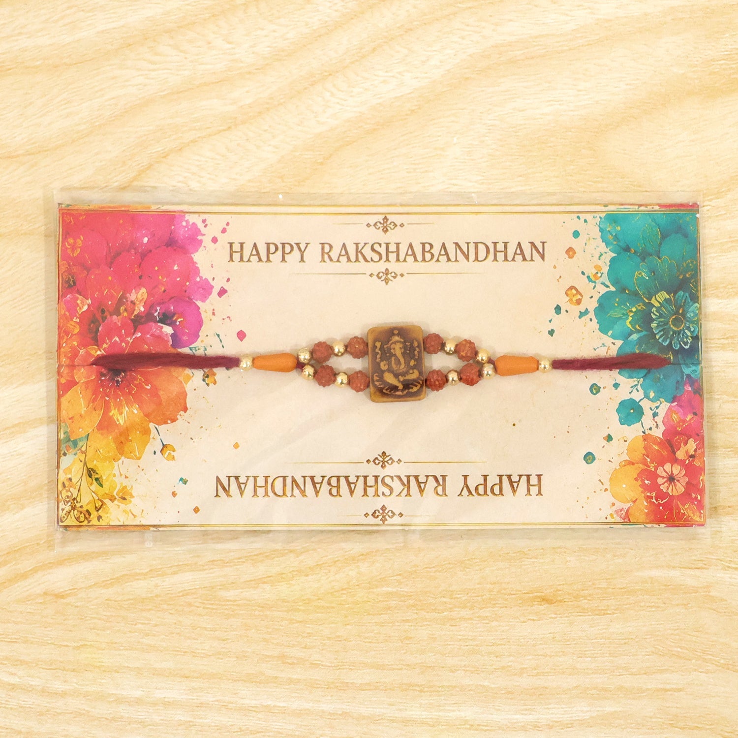 Ganesha Rudraksha Rakhi with Golden Beads – Traditional Rakhi