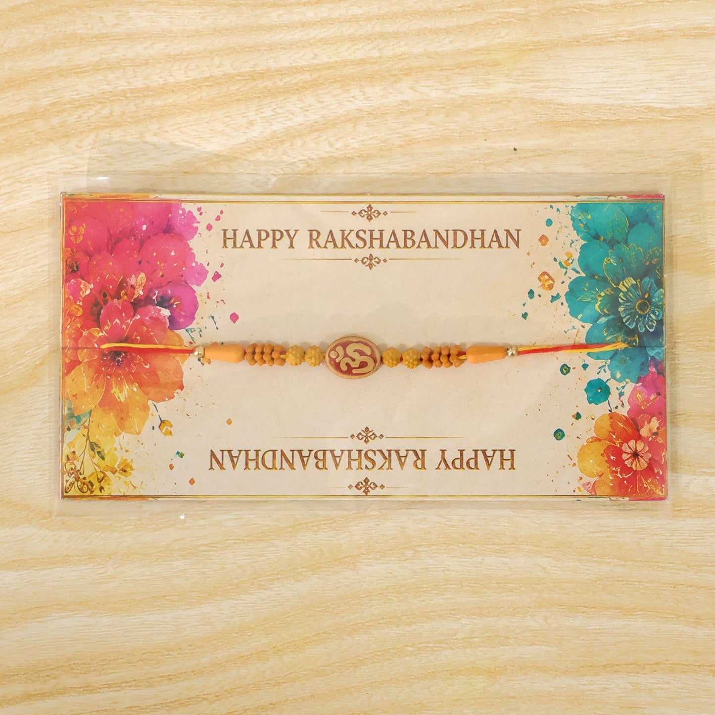 Divine Om Designer Rakhi with Golden Beads for Brother