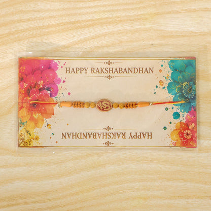 Divine Om Designer Rakhi with Golden Beads for Brother