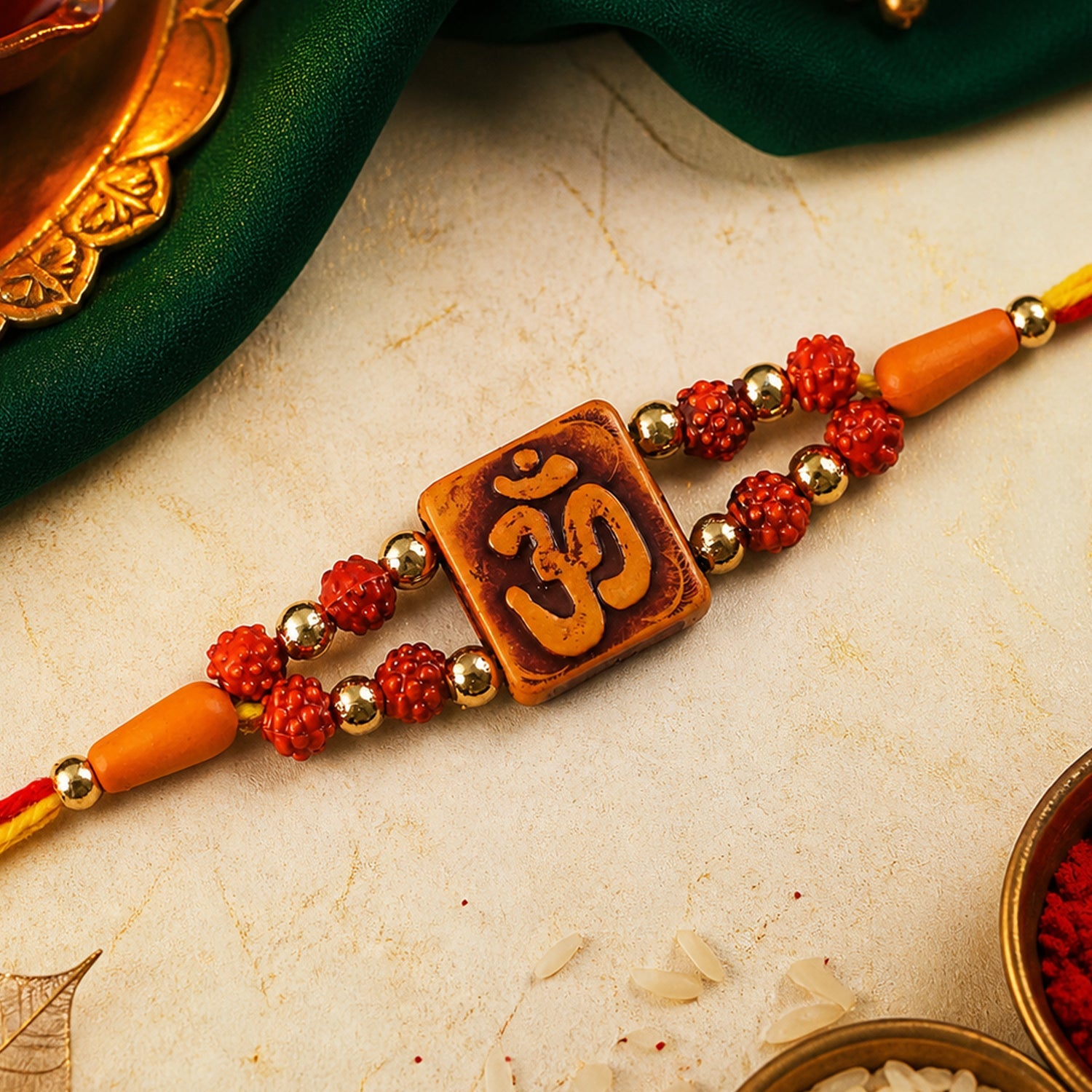 Square Om Engraved Rudraksha Golden Beads Traditional Rakhi